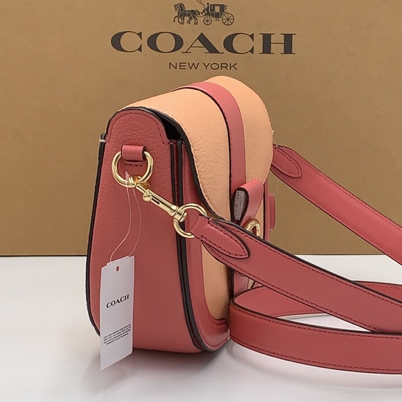 COACH Georgie Saddle Bag In Colorblock COLOR:
Gold/Faded Blush/Taffy - Picture 2 of 16